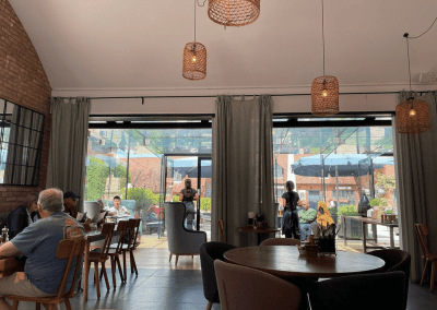 Bespoke curtains and soft furnishings for cafes, in bright and neutral colours to create an inviting and contemporary feel.