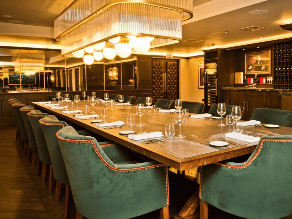 Interior of The Forest Hotel, a boutique hotel with sophisticated private dining room, featuring bespoke restaurant furniture with elegant detailing.